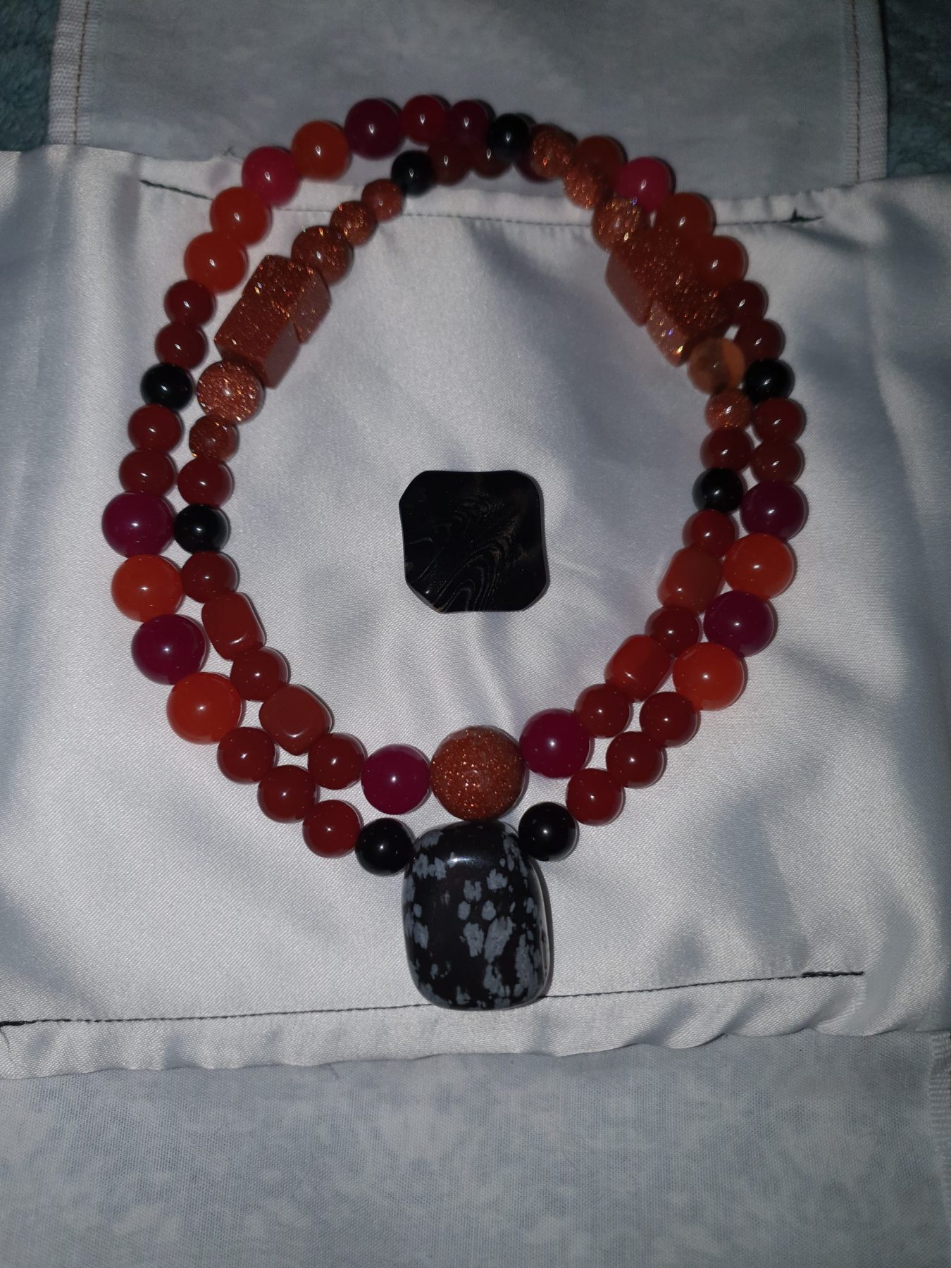 Red Carnelian, Goldstone And Snowflake Obsidian Necklace